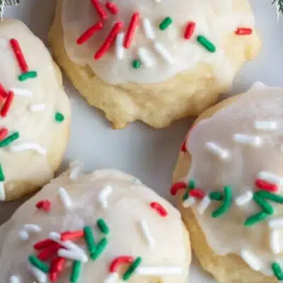 Best Italian Christmas cookie recipes to bake and share this holiday season featuring tasty Italian ricotta cookies and text title overlay.