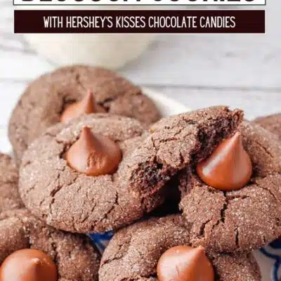 Best chocolate blossom cookies pin with text title and a plate of delicious cookies topped with Hershey's kisses.