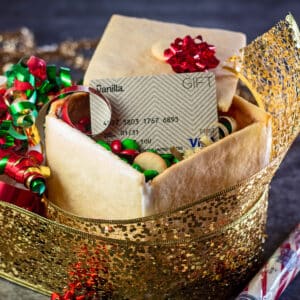 Best edible Christmas cookie gift box a fun idea to make with kids and fill with treats and small gifts.