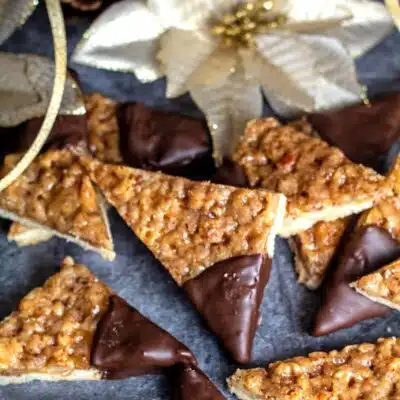 Best German Christmas cookies to bake featuring tasty nussecken cookies (or nut triangles).