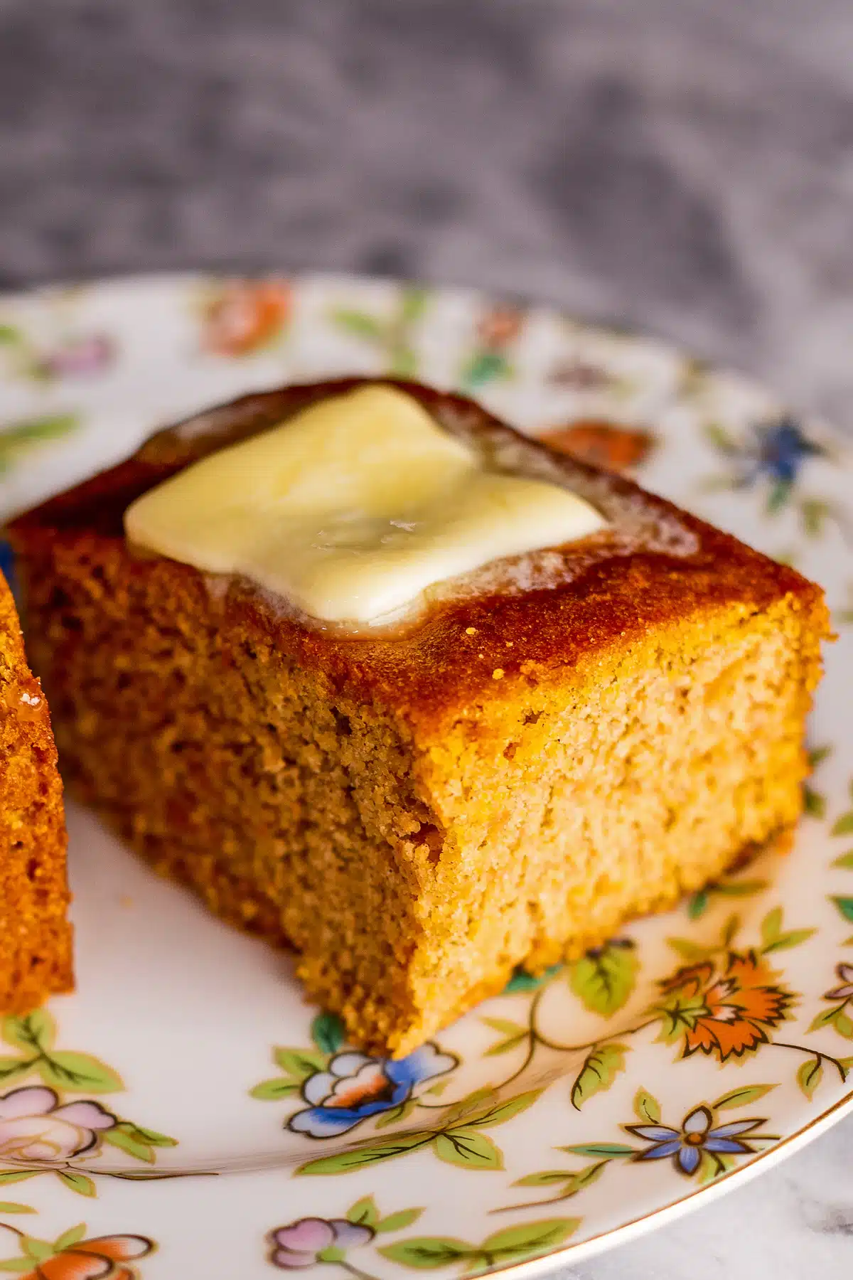 Best sweet potato cornbread recipe with my delicious cornbread sliced and served with butter.