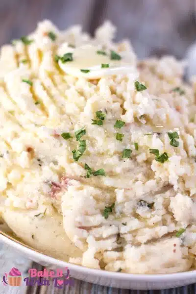 Tall image of bacon cream cheese mashed potatoes.