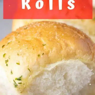Pin image with text of butter herb Rhodes rolls.