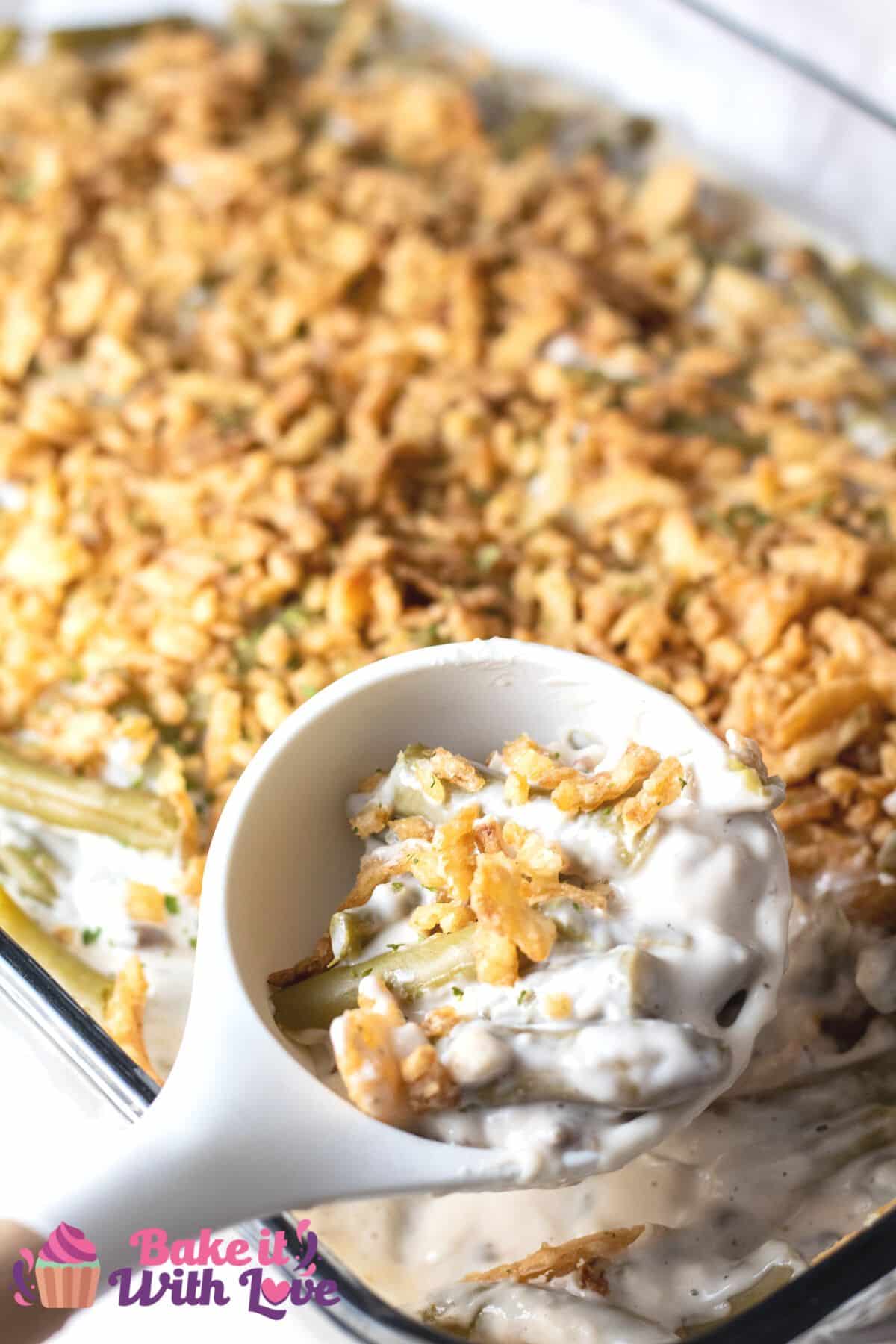 Tall image of Campbell's green bean casserole in a glass baking dish.