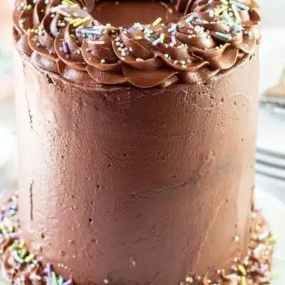 Square image of a chocolate birthday cake.