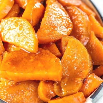 Tall image of Southern candied sweet potatoes.