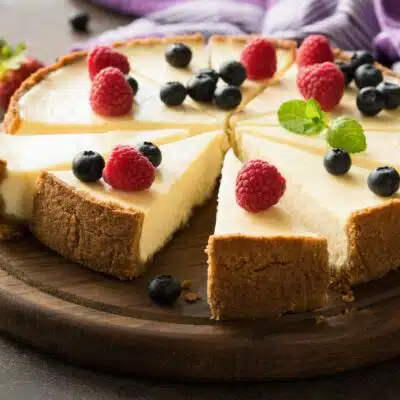 Square image of a sliced cheesecake.