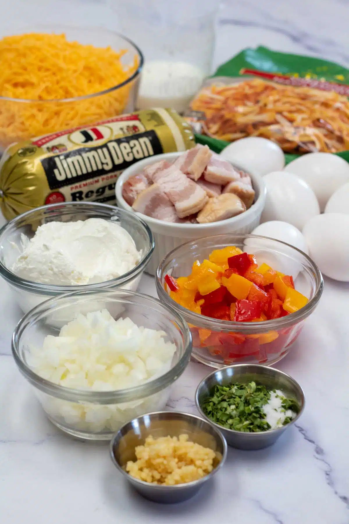 Tall image showing ingredients needed for this breakfast casserole.