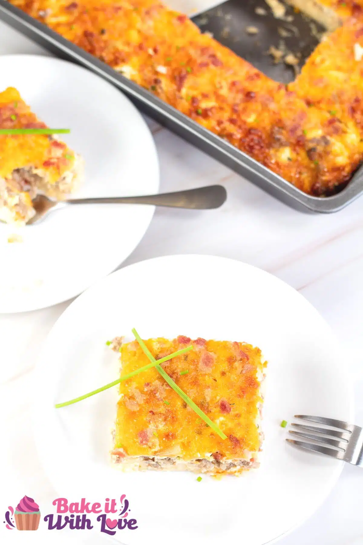 Tall image of hashbrown sausage bacon egg casserole.