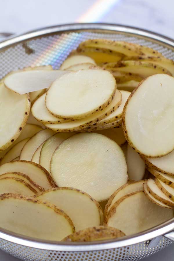 Process image 1 showing sliced potatoes in the instant pot.
