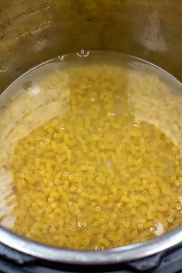 Process image 3 showing pasta covered in water.