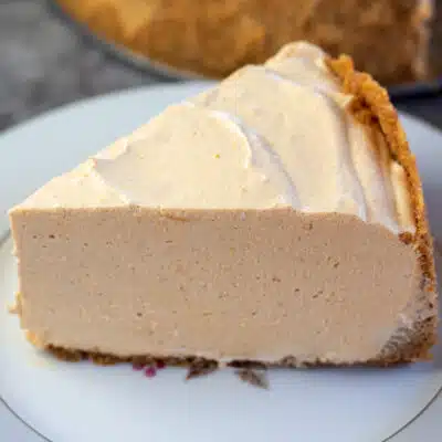 Square image of a slice of no bake pumpkin pie.