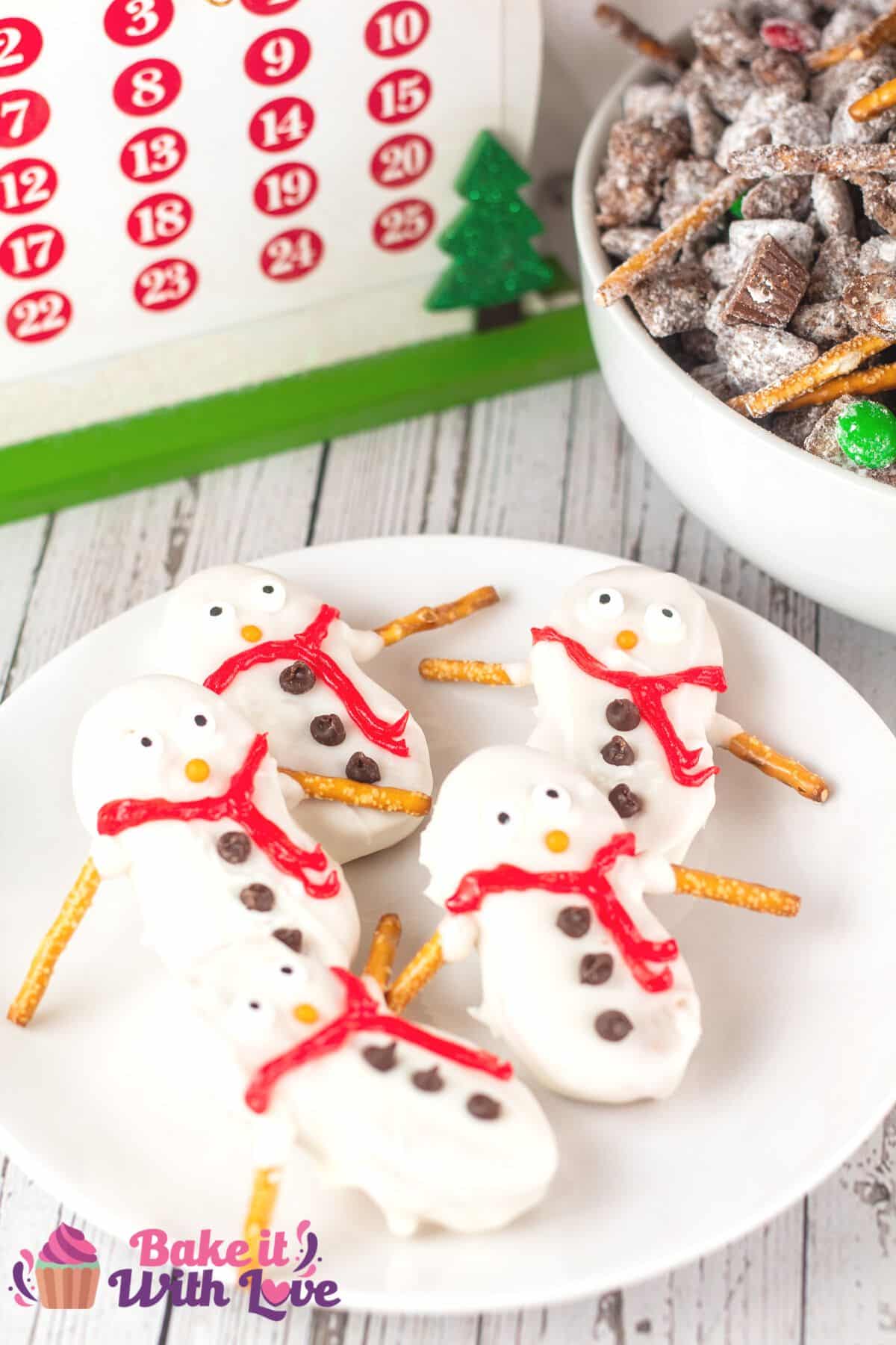 Tall image of nutter butter snowmen cookies.