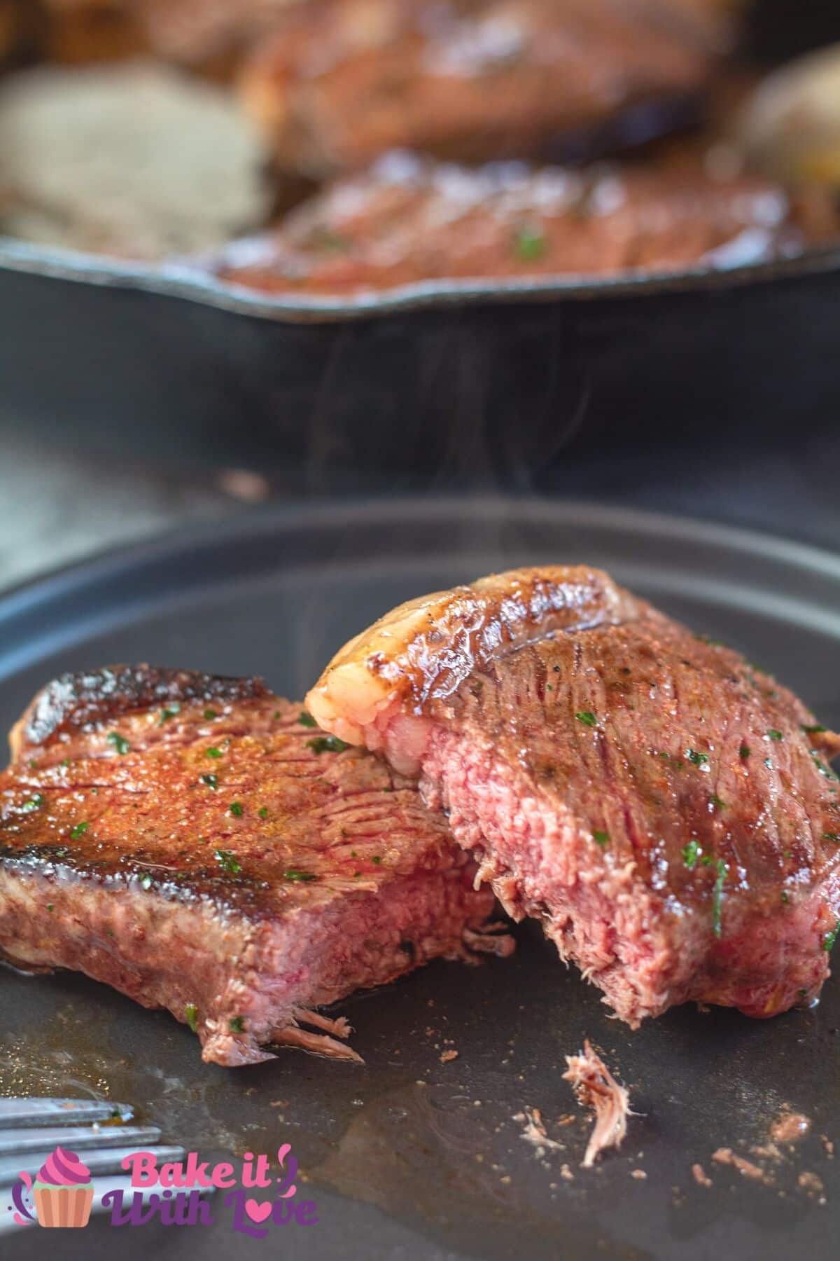 Tall image of picahna steaks in a cast iron pan.