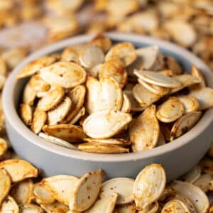 Square image of ranch roasted pumpkin seeds.