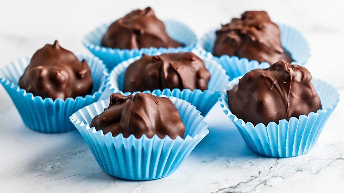Best chocolate billionaires candies in mini muffin liners for easy sharing.