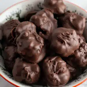 Best chocolate billionaires candies recipe with crucnhy caramel filling and rich chocolate coating.