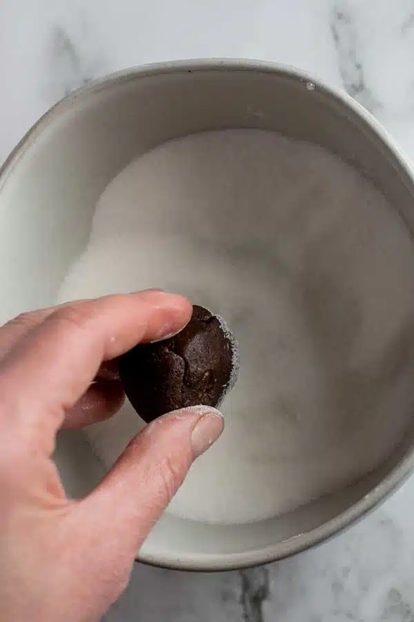 Chocolate peppermint crinkle cookies process photo 11 dip the rolled cookie dough balls into granulated sugar.