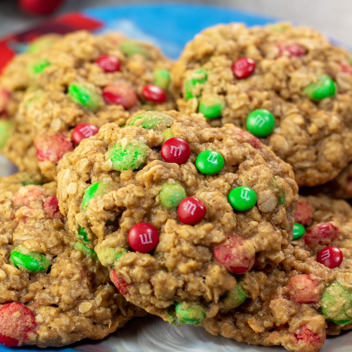 Square image showing Christmas M&M oatmeal cookies.