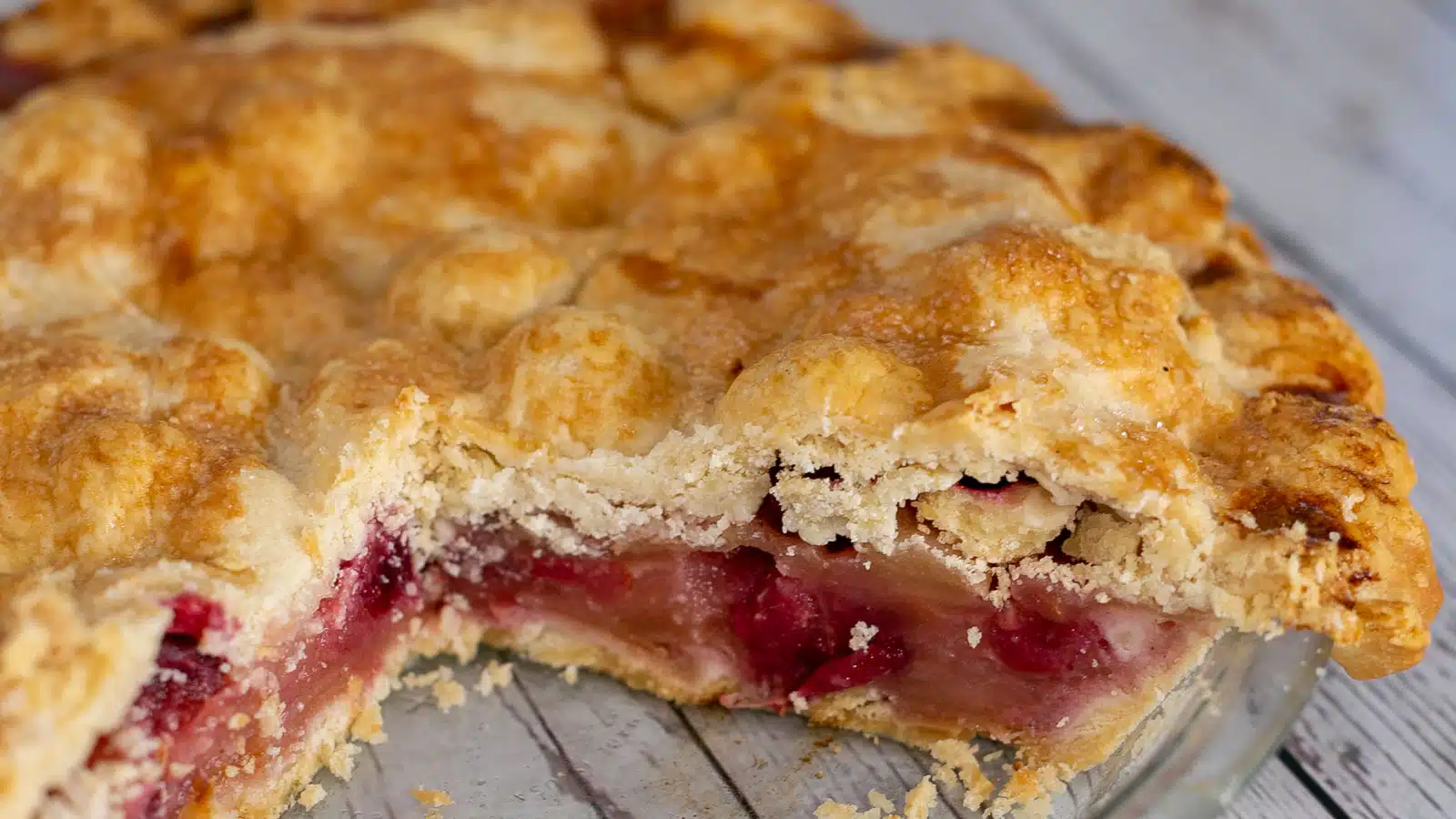 Wide image of apple-cranberry pie.