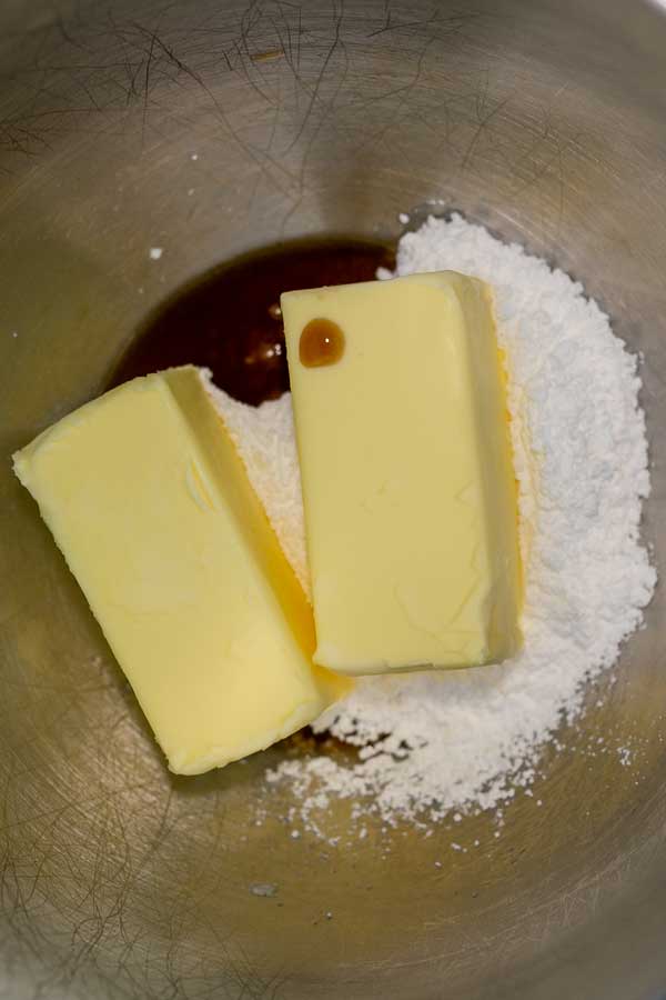 Process image 1 showing butter, sugar, and vanilla in a mixing bowl.