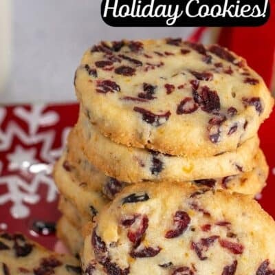 Pin image with text showing cranberry orange shortbread cookies.