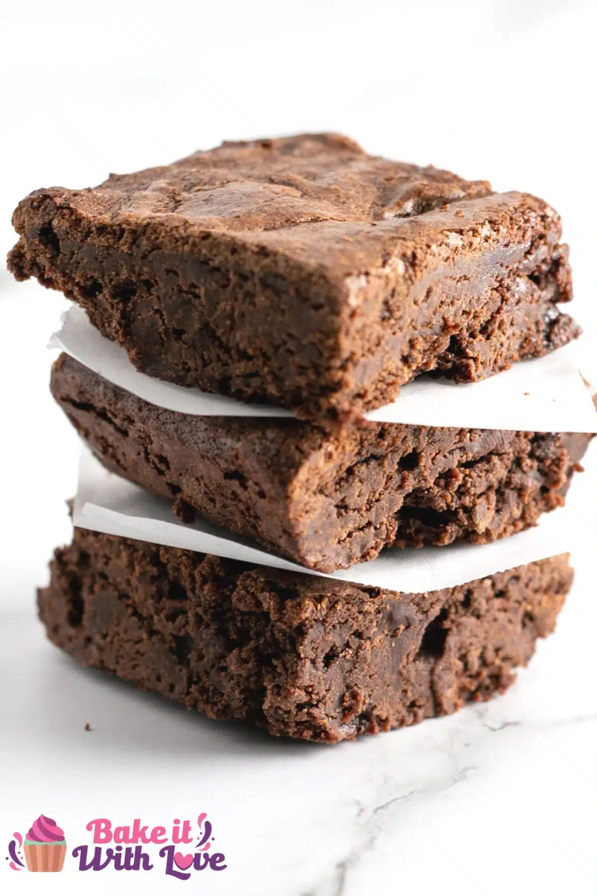 Tall image showing a plate of fudge brownies.