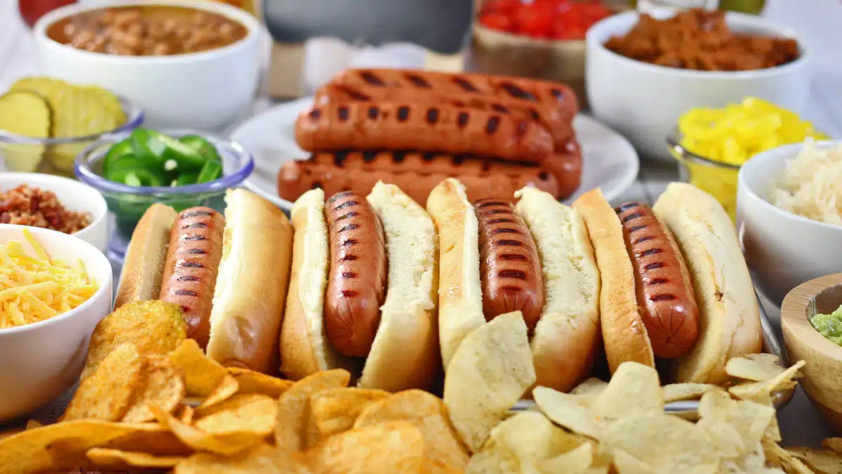 Best hot dog bar toppings and ideas all arranged and ready to serve to a crowd.
