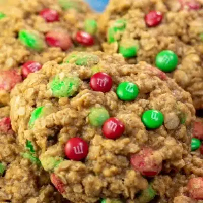 Square image showing Christmas M&M oatmeal cookies.