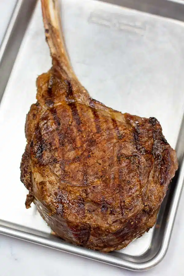 Process image 4 showing grilled tomahawk ribeye resting.