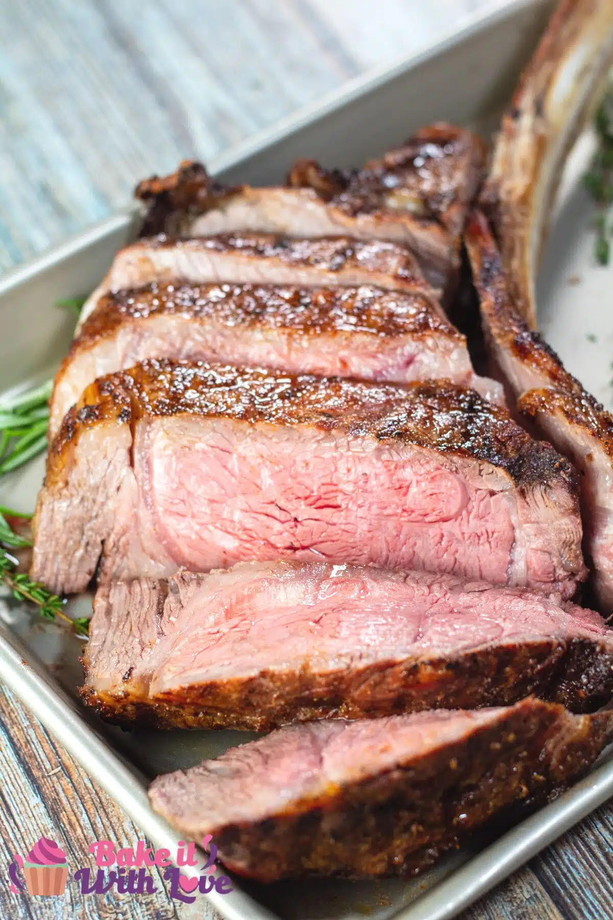 Tall image showing grilled tomahawk ribeye.