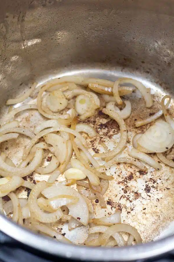 Process image 6 showing sauteing onions in instant pot.