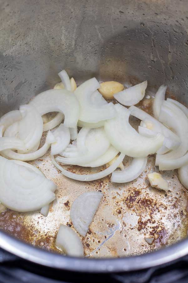 Process image 4 showing sauteing onions.