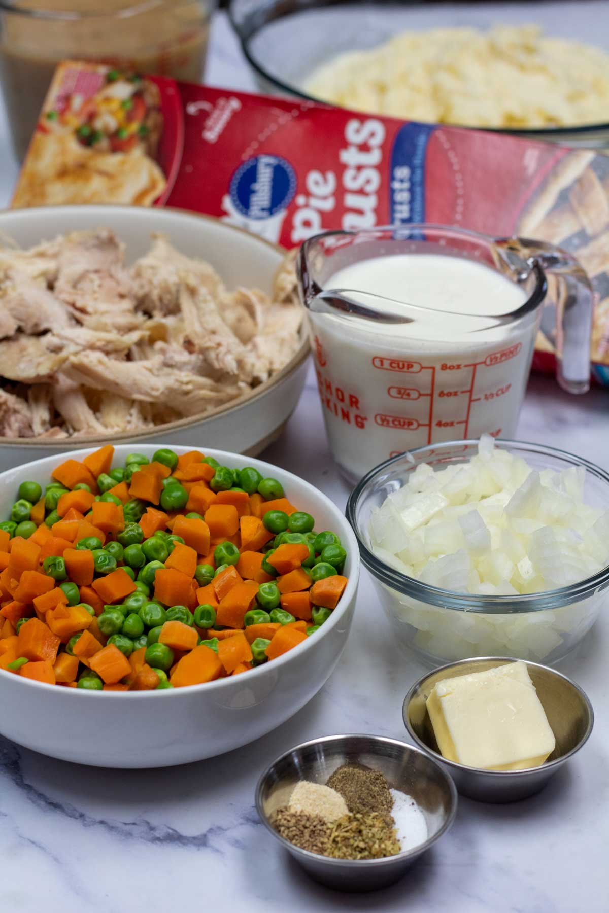 Tall image showing leftover turkey pot pie ingredients.