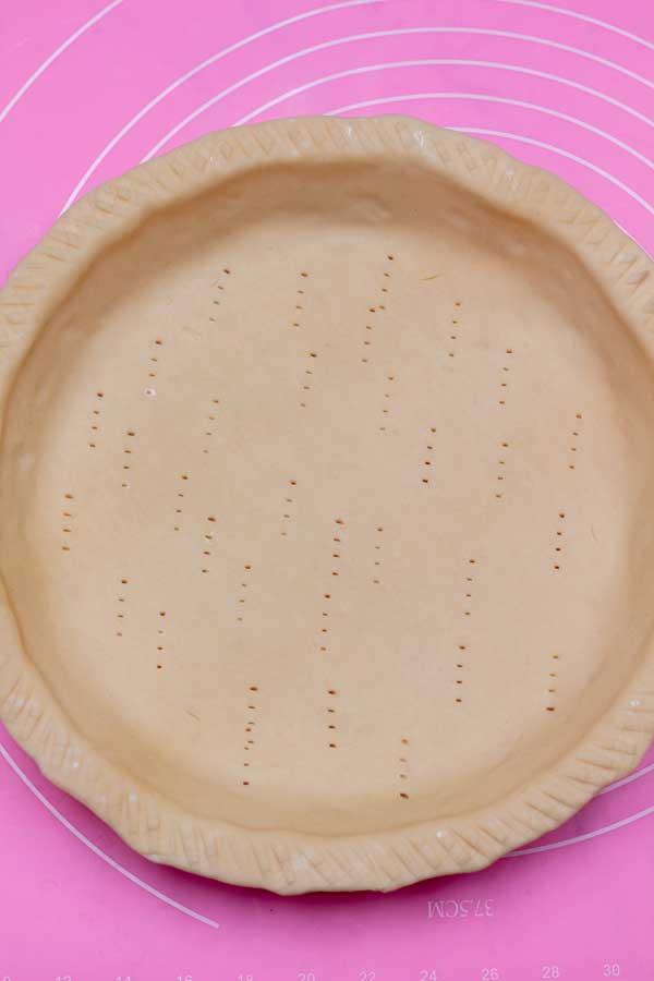 Process image 9 showing pot pie pie crust with fork poked holes.