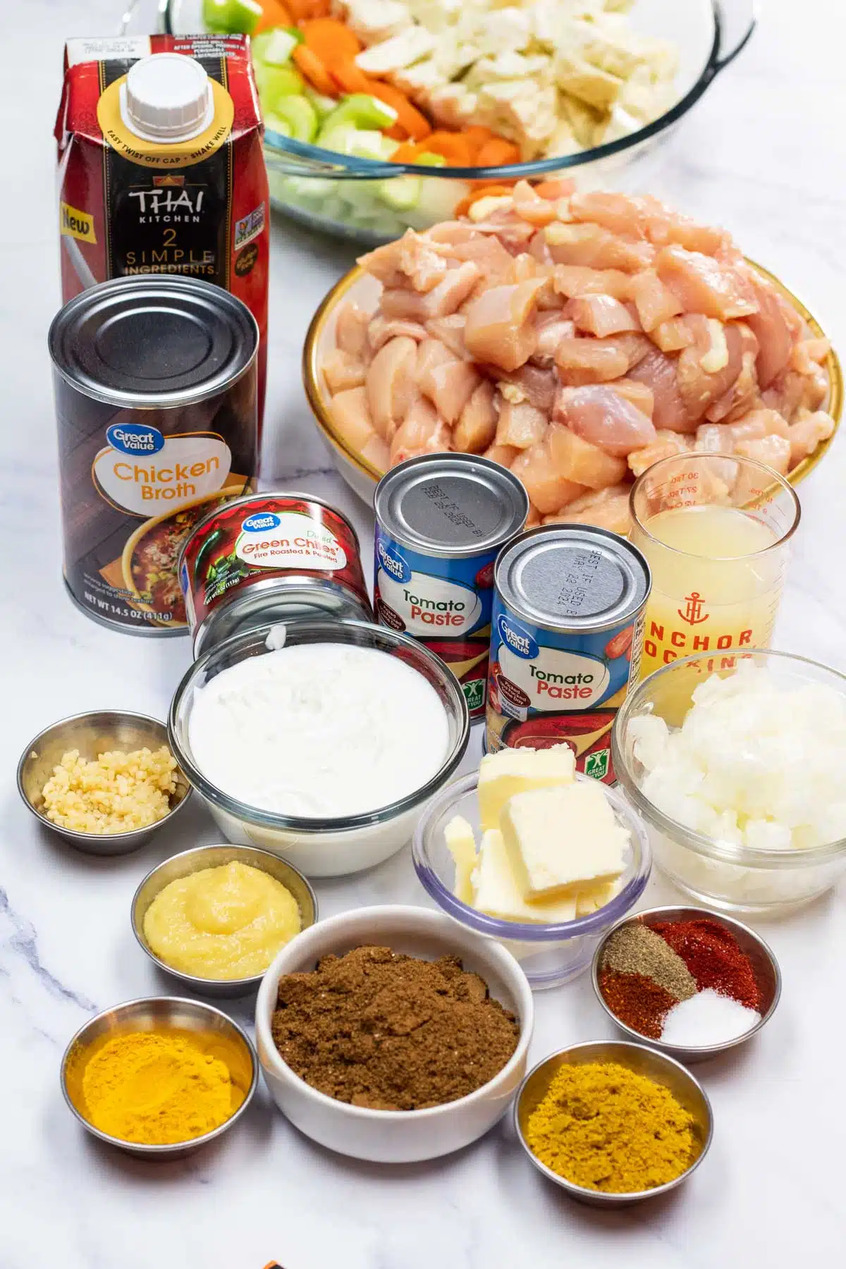 Tall image of butter chicken ingredients.