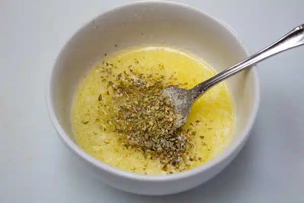 Process image 3 showing melted butter with added seasoning.