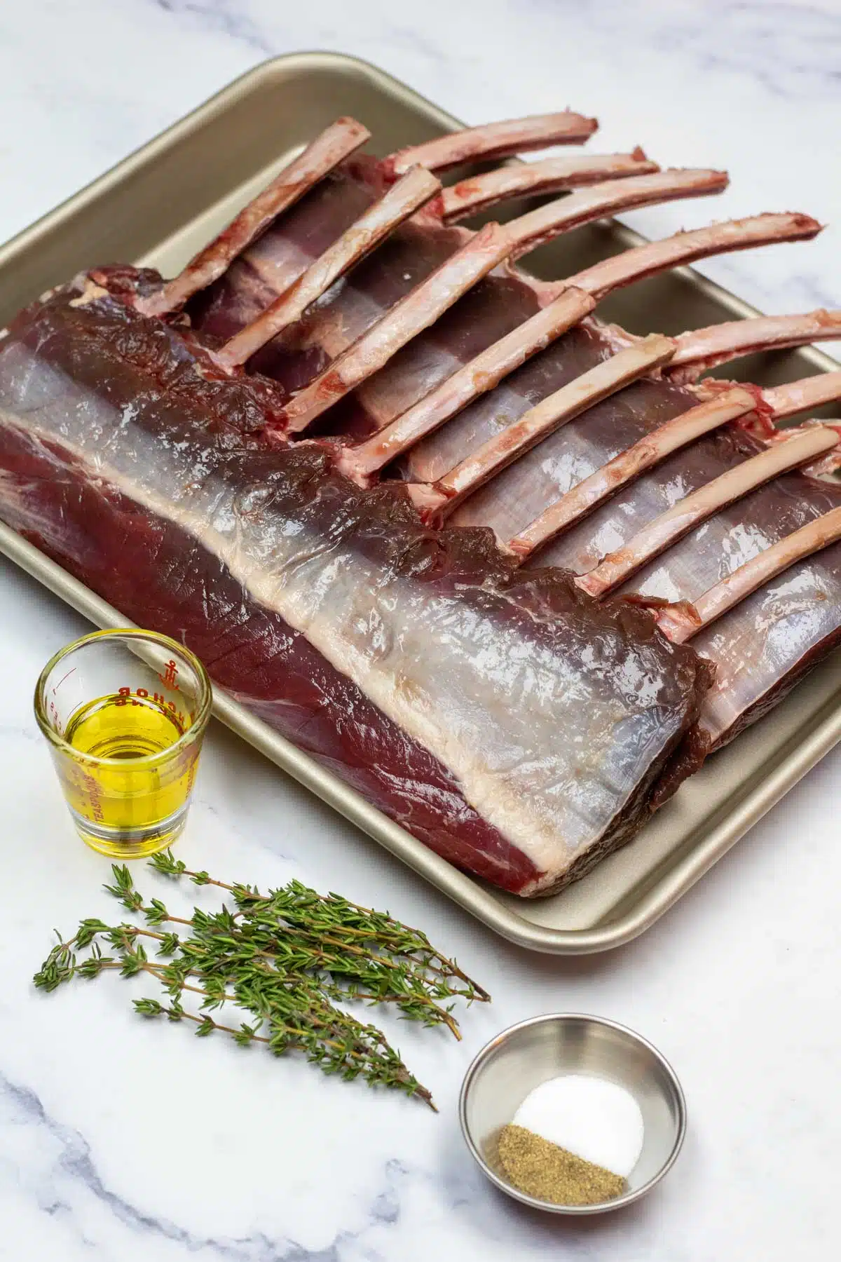 Tall image of venison rib roast ingredients.