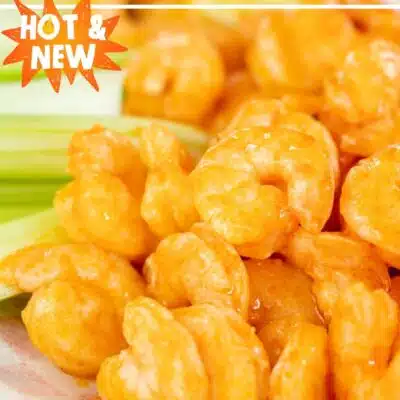 Pin image with text showing buffalo shrimp in a basket with celery.