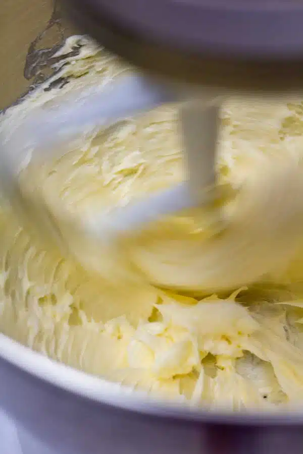 Process image 6 showing butter being mixed in a bowl.