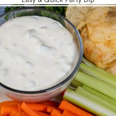 Pin image with text showing dill pickle dip with carrots, chips, and celery.