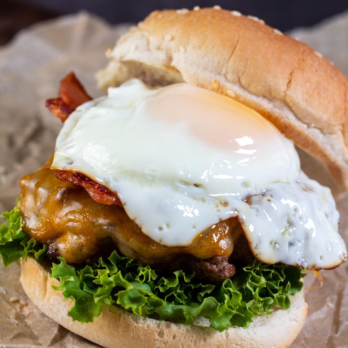 Square image of an egg burger.