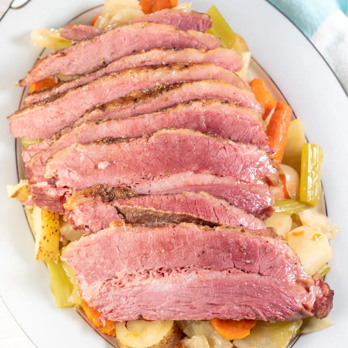 Square image of sliced Instant Pot corned beef.