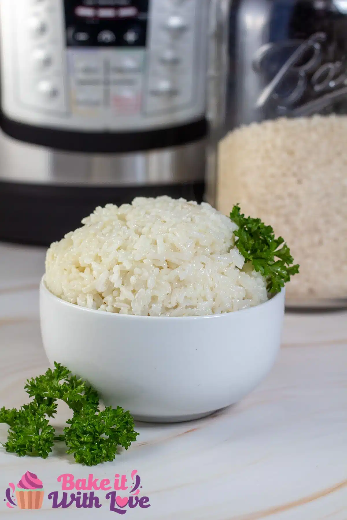 Tall image of long grain white rice cooked in a instant pot.