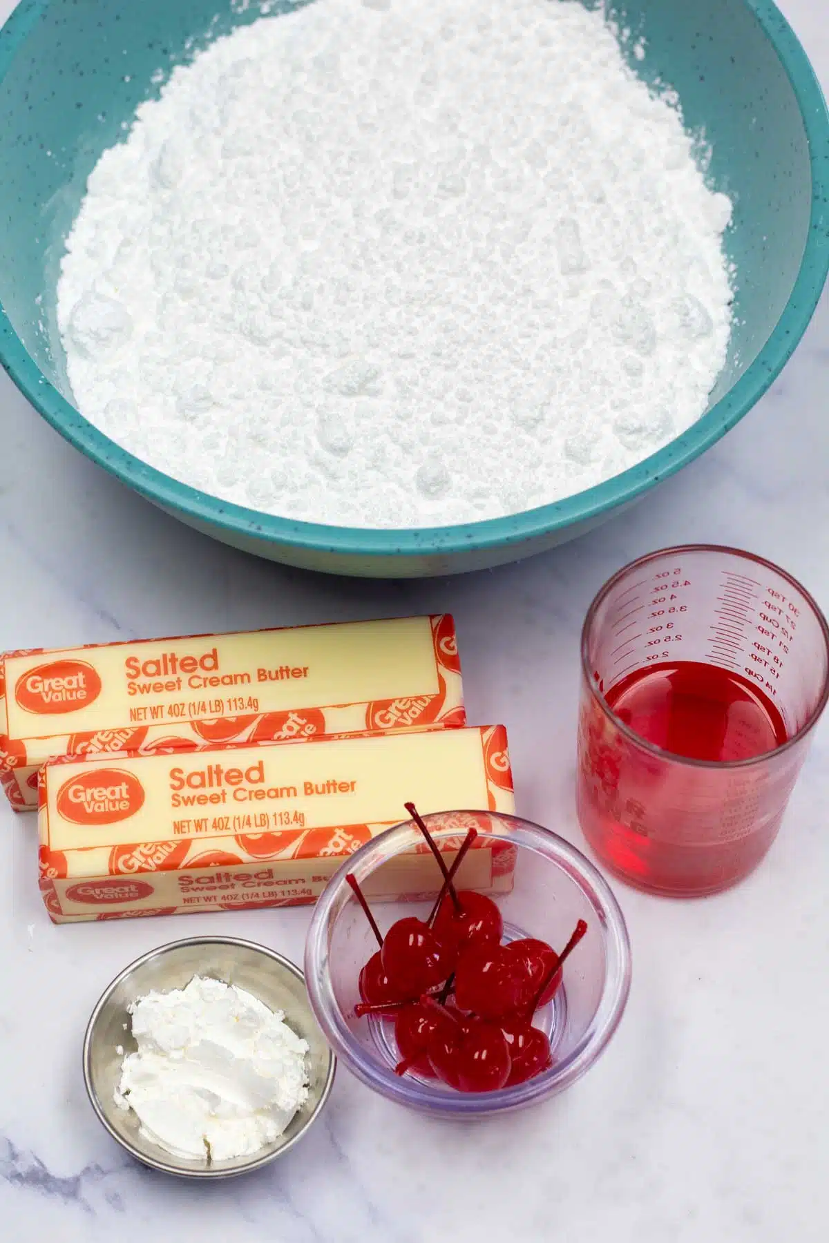 Tall image showing maraschino cherry buttercream ingredients.