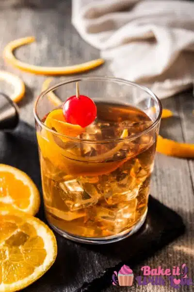 Tall image showing old fashioned cocktail drink.