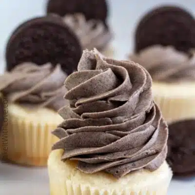 Pin with text image showing cupcakes with Oreo buttercream frosting.