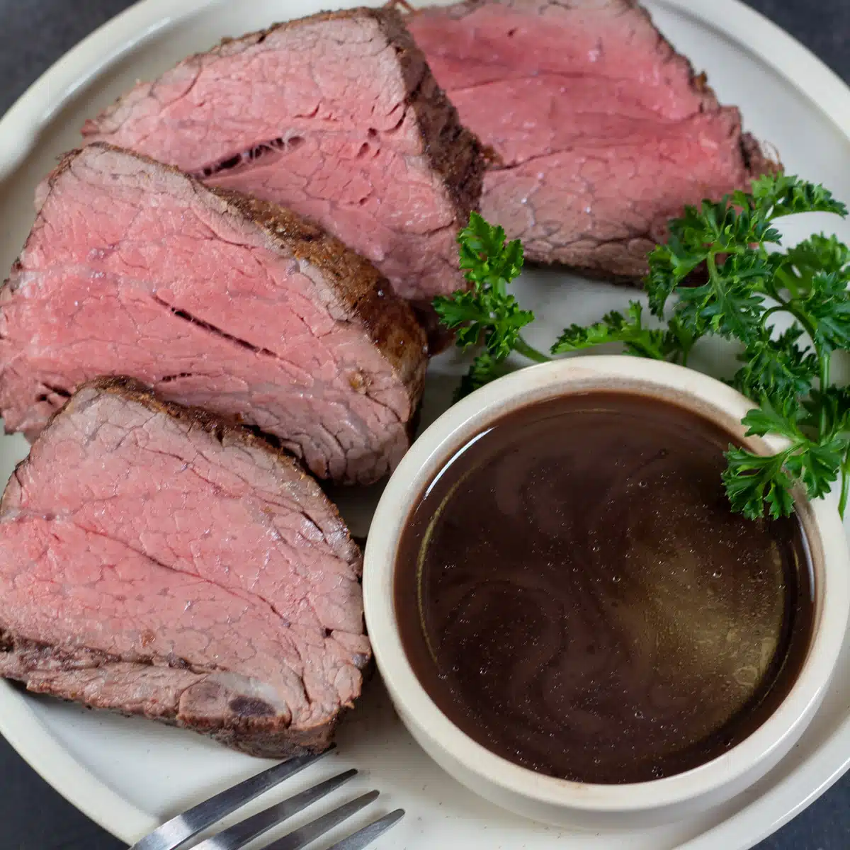Square image of red wine reduction sauce.