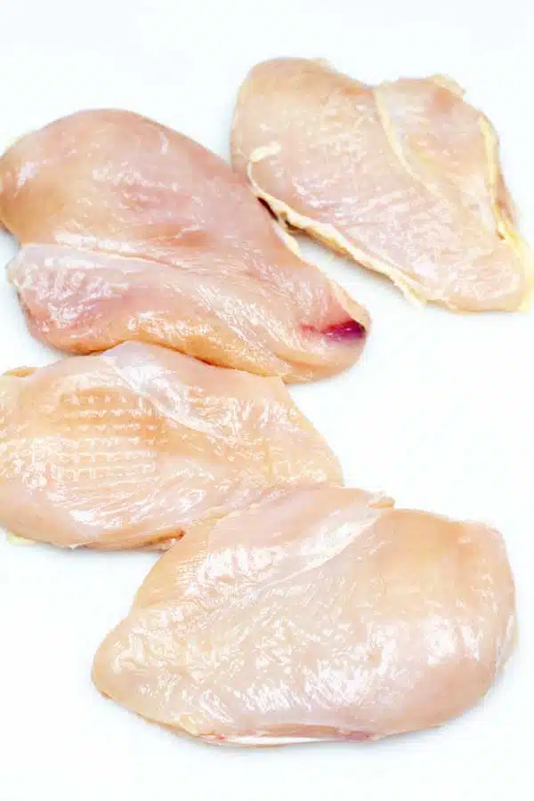 Process image 3 showing pounded chicken breasts.