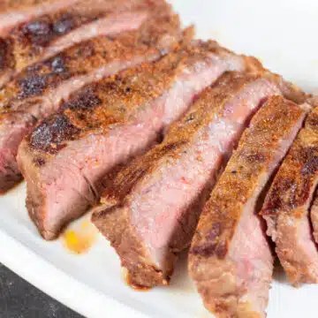 Wide image of sliced sous vide New York steak.